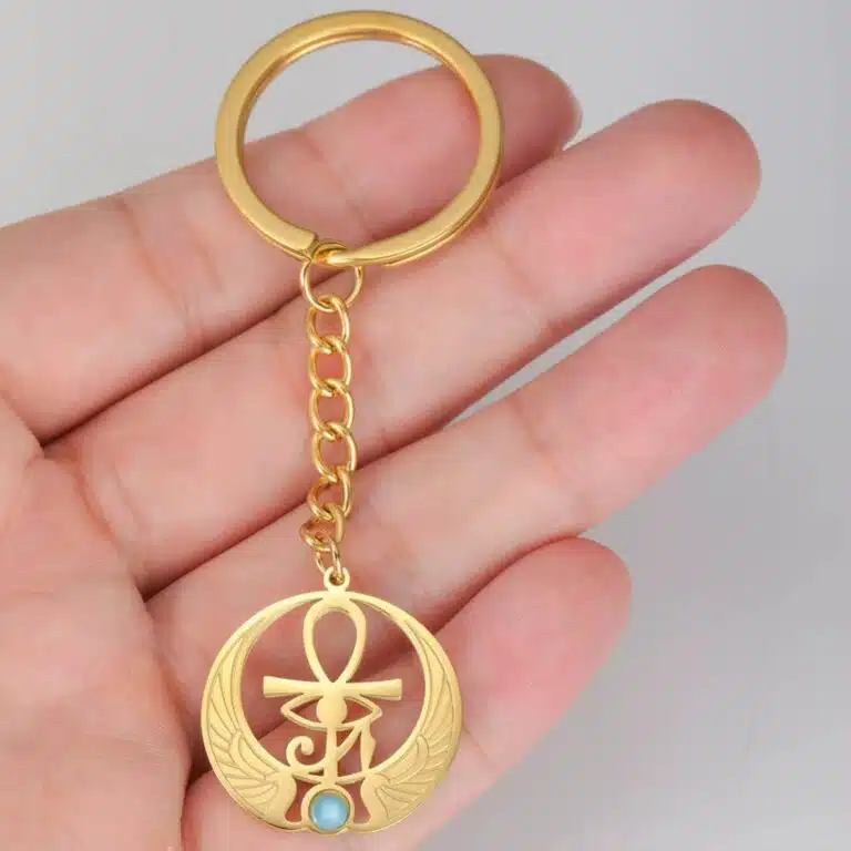 Porte-clés Ankh doré avec aile et pierre turquoise