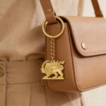 Porte-cles-lion-et-soleil-perse-en-inox-picture-3